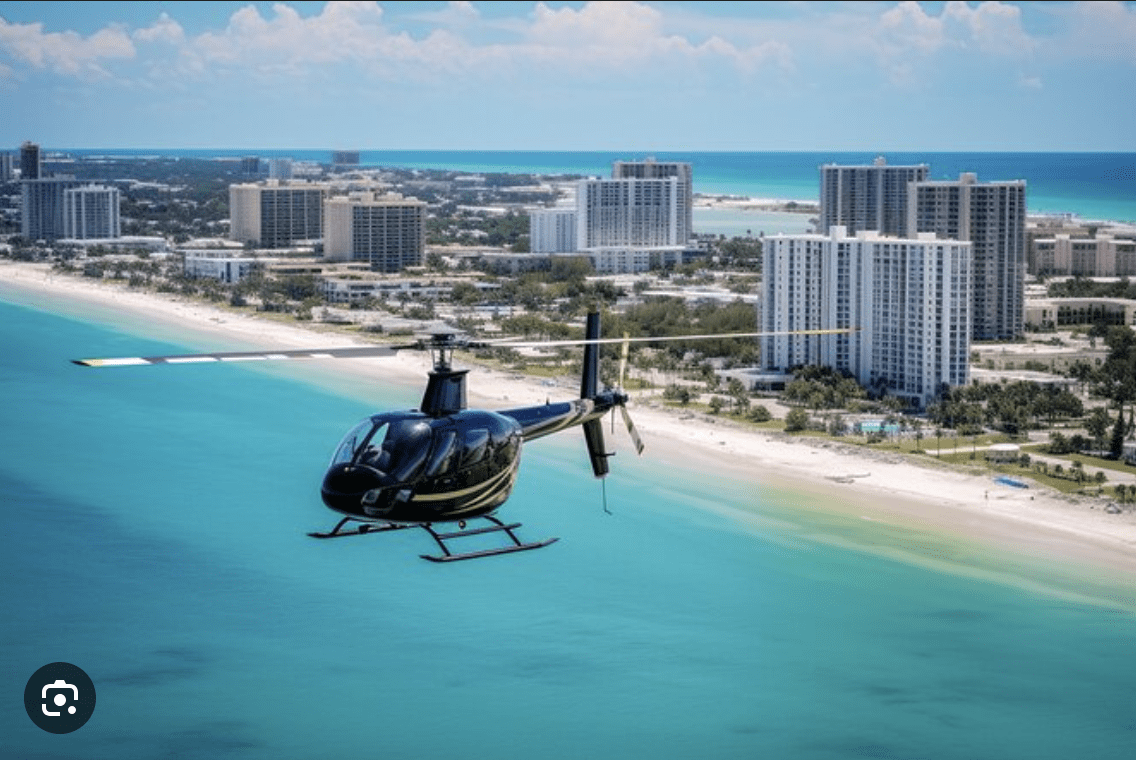 Helicopter tour flying over the turquoise waters and beaches of Clearwater Beach Florida
