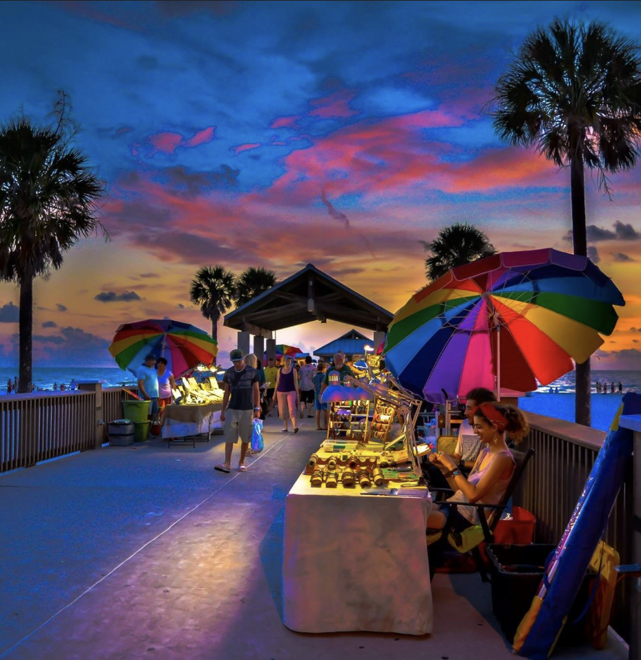 Vibrant sunset over Pier 60 market stalls at Clearwater Beach Florida