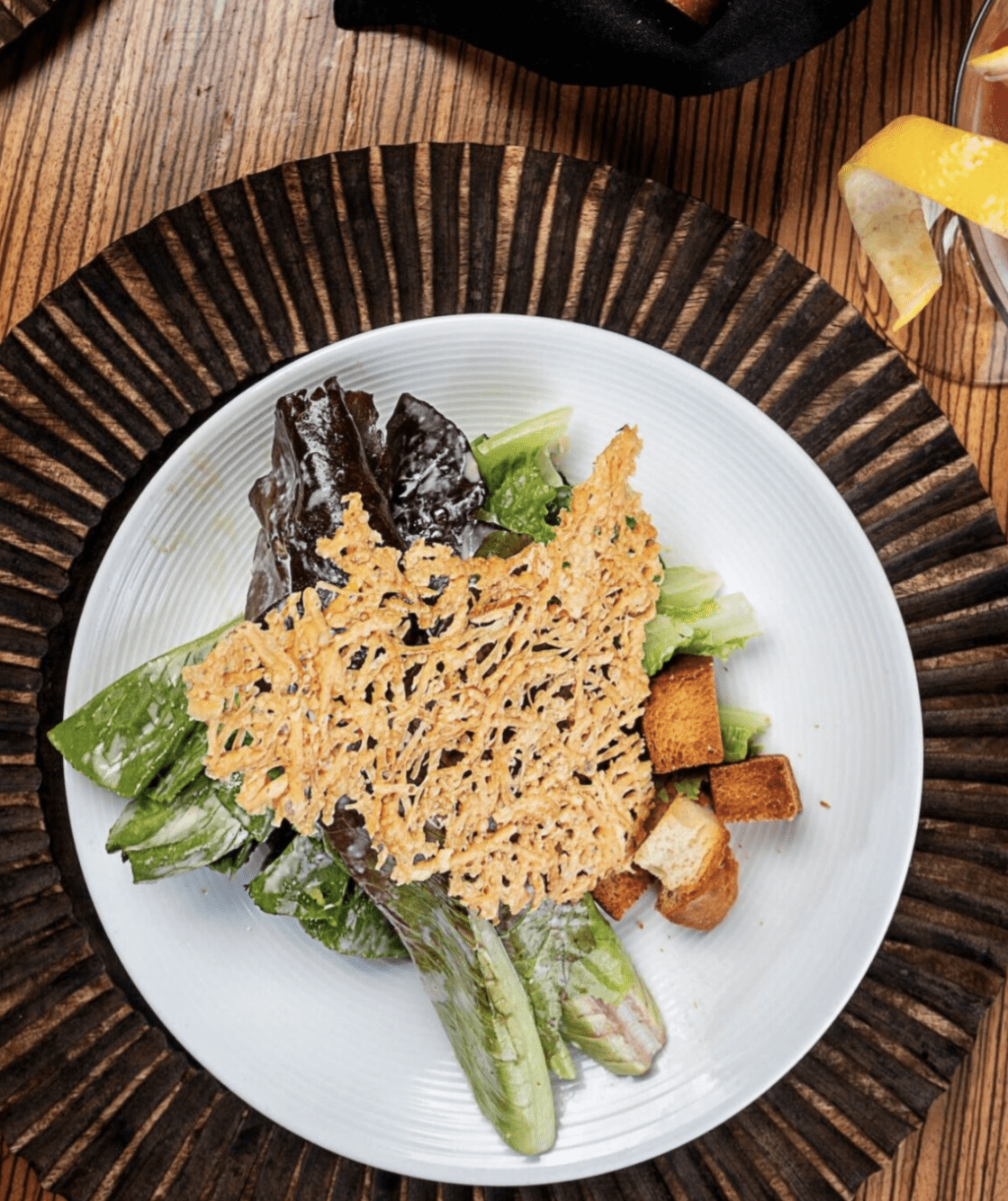 Fresh Caesar salad with parmesan crisp at a Clearwater Beach waterfront restaurant