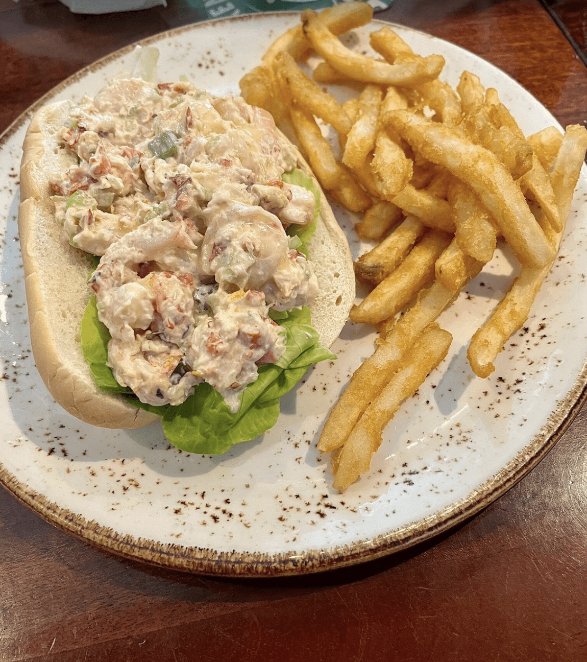 Shrimp salad roll with fries at an Indian Rocks Beach beach bar