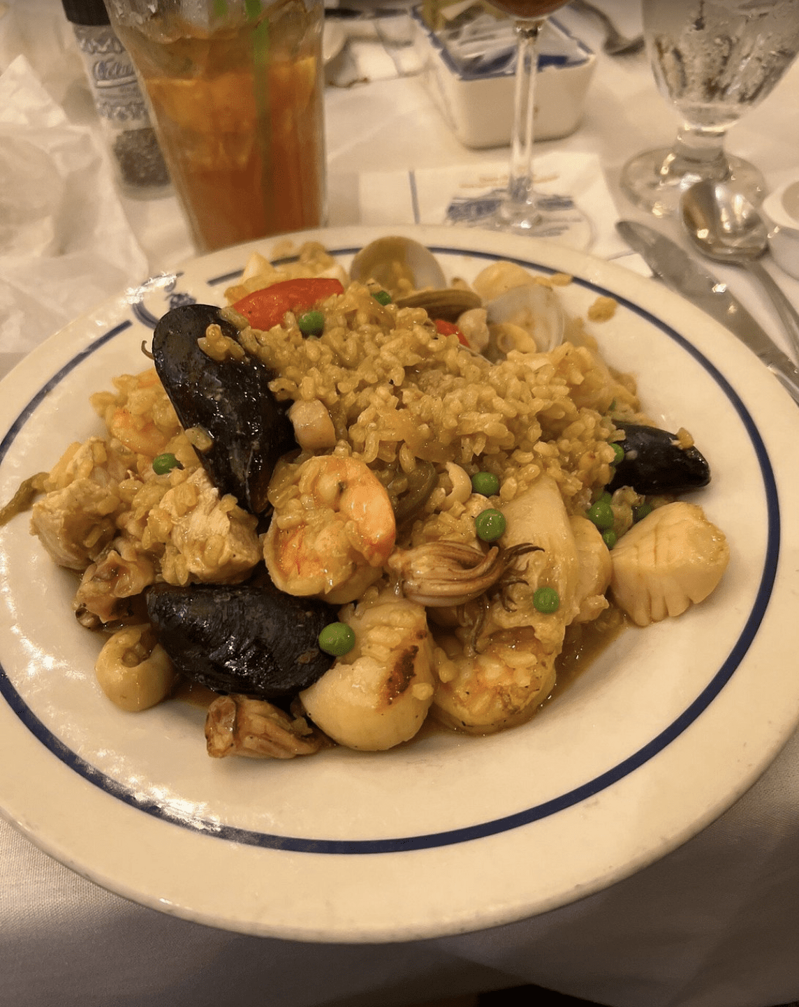 Traditional Spanish seafood paella with shrimp, mussels, clams, and rice served in Clearwater Beach.