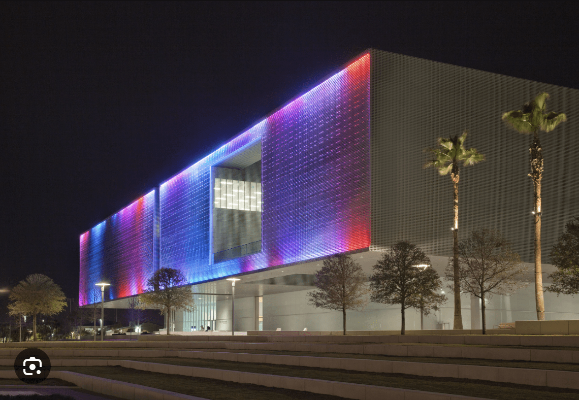 Tampa Museum of Art illuminated at night near Clearwater Beach.